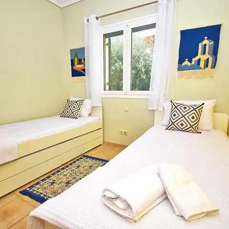 Pebbles And Sea At With Shared Pool *