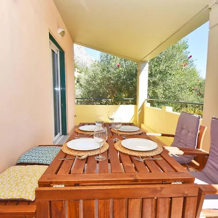 Pebbles And Sea At With Shared Pool