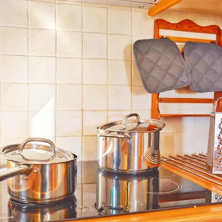 Pebbles And Sea At With Shared Pool