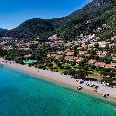 Pebbles And Sea At With Shared Pool
