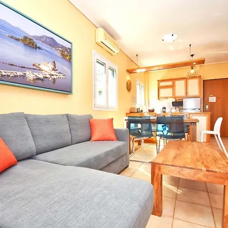 Pebbles And Sea At With Shared Pool